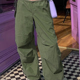green-track-pants